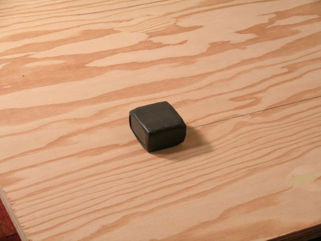 Adhere sound isolators on a 1" piece (or 2 1/2" pieces glued and screwed together) of plywood 41 3/4" by 90 3/8" (2.5 x 106 x 229 cm.)