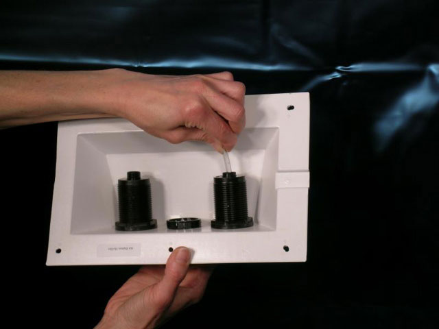 972Cut clear tubes about 1' (.3m) beyond liner slit and attach tube to air button.