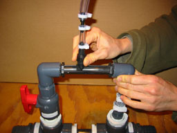 1135Attach other end of tube to the manifold.