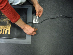 160Tape the header cord in place.