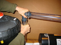 640 Slide the fitting onto the tube entering the filter. Clamp